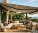 Hospitality-style outdoor dining area with weather screening