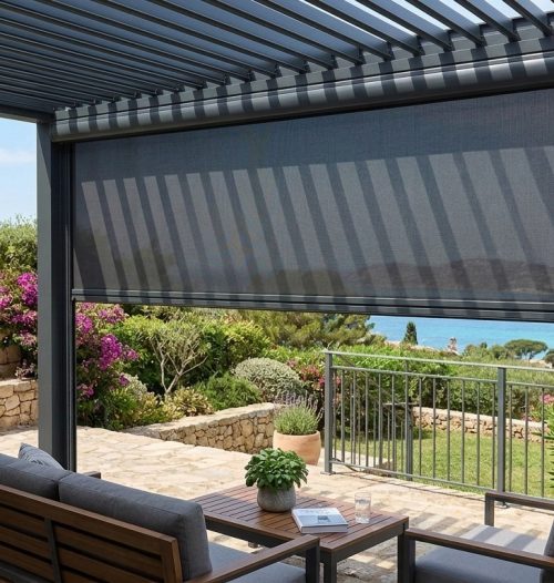 Adjustable aluminium louvre roof above a modern South African patio