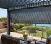 Adjustable aluminium louvre roof above a modern South African patio