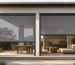 Channel-guided and zip-guided outdoor blinds compared on a modern covered patio