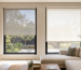 Sunscreen and light-filtering roller blinds compared in a bright interior