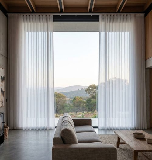 Illustrative example of sheer curtains at a living room window